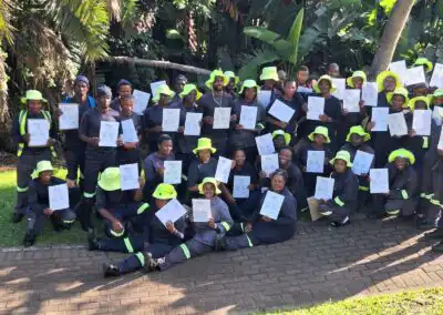 Certificate of achievement for eco-friendly landscaping team in lush green garden having fun in sunlight.