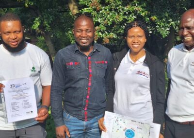 Sustainable landscaping team celebrating eco-friendly landscaping solutions, promoting green initiatives and environmental responsibility.