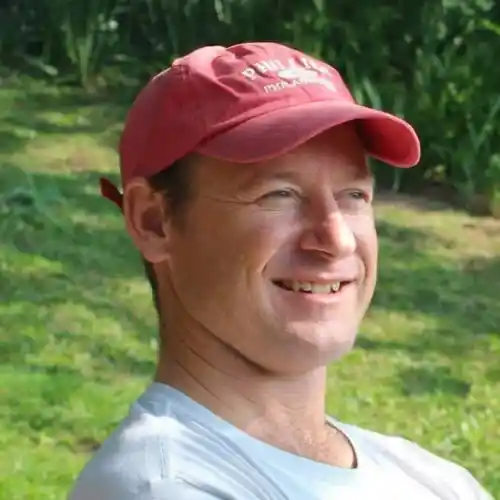 Gavin Vorster Testimonial Countryline Sunny man in outdoor garden, promoting sustainable landscaping practices, finding green solutions for eco-friendly gardens.